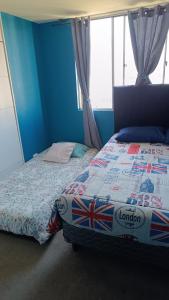 Postel nebo postele na pokoji v ubytování Departamento 1 dormitorio, cercano aeropuerto y clínicas destacadas + 2 fotografie