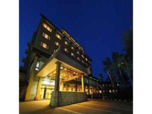 a building at night with its lights on at Yahatakan - Vacation STAY 32426v in Sado