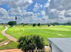 a view of a golf course with a green at Fairway Escape in Grooteiland