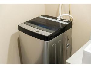a small appliance with a window on top of it at MUSUBI HOTEL KAMIGOFUKU-MACHI 1 - Vacation STAY 48031v in Hakata