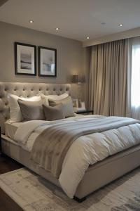 Ένα ή περισσότερα κρεβάτια σε δωμάτιο στο BHotel