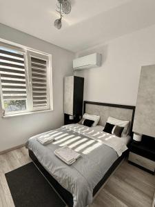 Ένα ή περισσότερα κρεβάτια σε δωμάτιο στο Sky