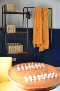 a chess board on a table in a room at L'Insolite in Gorges