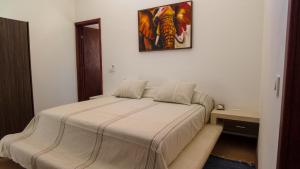 Ένα ή περισσότερα κρεβάτια σε δωμάτιο στο THE HOUSE VILLA 8pax +12 φωτογραφίες