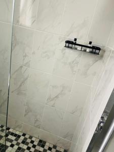 Ванная комната в Palm Inn Boutique Palapye