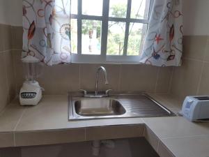 Kuchyň nebo kuchyňský kout v ubytování Villa Ema en Villas Camino Real cerca de las dunas de Chachalacas + 50 fotografií