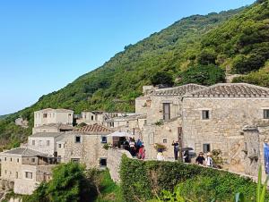 a group of people standing on top of a mountain at 芹壁望海樓民宿 in T'ung-ko +47 photos