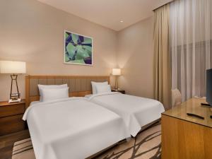 Телевизор и/или развлекательный центр в Rixos Park Belek - The Land Of Legends Access