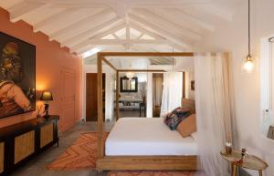 Postel nebo postele na pokoji v ubytování Villa La Créole - Anse Marcel