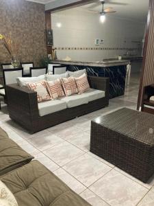 Postel nebo postele na pokoji v ubytování CASA DE PRAIA COM PISCINA e AREA GOURMET