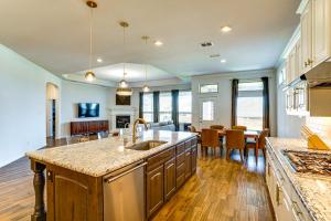 a kitchen with a sink and a counter top at Less Than 20 Mi to Fort Worth Family-Friendly Aledo Home in Willow Park