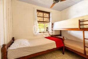 Postel nebo postele na pokoji v ubytování Casa c/ Piscina: Férias de Descanso em Pontal