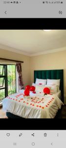 Ένα ή περισσότερα κρεβάτια σε δωμάτιο στο The Glen Guest house
