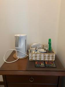 a table with a coffee maker and a coffeemaker at Patagonia Heritage Home in Punta Arenas +47 photos