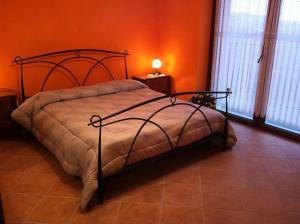 Posteľ alebo postele v izbe v ubytovaní il Balcone sul Monferrato
