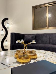 Et opholdsområde på Cozy 2-Bed Apartment with Kitchen & Dining