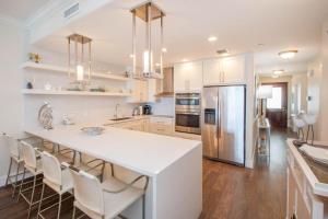 Dapur atau dapur kecil di Beachcomber 19 +16 gambar