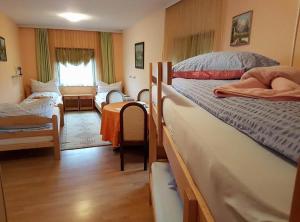 Postel nebo postele na pokoji v ubytování Guest House Rose