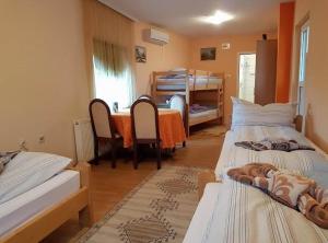 Postel nebo postele na pokoji v ubytování Guest House Rose