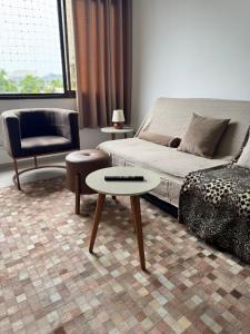 Χώρος καθιστικού στο Duplex Comfort Torres RS
