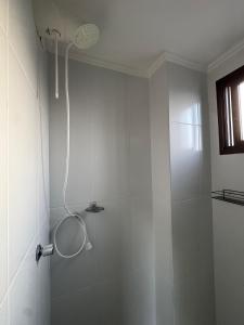 Ένα μπάνιο στο Duplex Comfort Torres RS +59 φωτογραφίες
