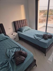 Postel nebo postele na pokoji v ubytování Villa Tozali avec piscine chauffée + 46 fotografií