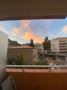 a view out of a window of a city at La Casetta Serena, Climatisé, Wifi, proche plage in Menton