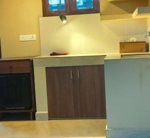 Η κουζίνα ή μικρή κουζίνα στο WanKai Homestay