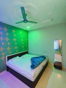 Ένα ή περισσότερα κρεβάτια σε δωμάτιο στο Hotel sagar palace