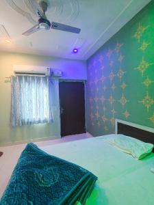 Ένα ή περισσότερα κρεβάτια σε δωμάτιο στο Hotel sagar palace