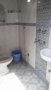 Ванная комната в Marigold Guest House