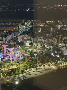 an aerial view of a city at night at Căn hộ 2 phòng ngủ Vinhomes Grand Park, Hồ Chí Minh city in Gò Công