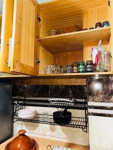 Kuchyň nebo kuchyňský kout v ubytování Cozy apartment