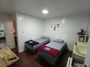 Ένα ή περισσότερα κρεβάτια σε δωμάτιο στο Recanto dos Sabiás +49 φωτογραφίες
