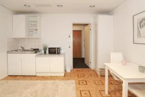 Η κουζίνα ή μικρή κουζίνα στο Studio apartment in Kaivoksela for two persons