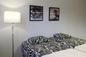 Ένα ή περισσότερα κρεβάτια σε δωμάτιο στο Studio apartment in Kaivoksela for two persons