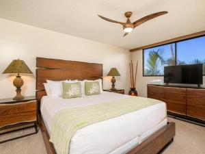 En eller flere senge i et værelse på Polo Beach Club 206