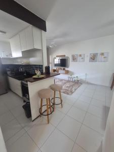 Kuchyň nebo kuchyňský kout v ubytování Apart Hotel Copacabana