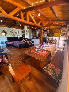 an overhead view of a living room with a table at Casa Principal in Itapeva