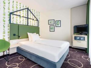 Postel nebo postele na pokoji v ubytování Mercure Hotel Hannover Mitte + 153 fotografií