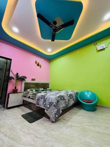 Postel nebo postele na pokoji v ubytování Aras homestay hampi