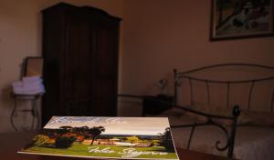 A bed or beds in a room at Rosso Di Sera