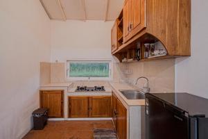 Η κουζίνα ή μικρή κουζίνα στο Santya Loka Lodge & Twin Waterfall +45 φωτογραφίες