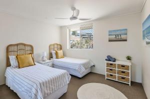 Ένα ή περισσότερα κρεβάτια σε δωμάτιο στο Craigmore Penthouse - Endless Ocean Views