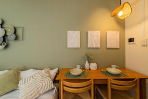 Postel nebo postele na pokoji v ubytování Shinjuku Homely Stay + 48 fotografií