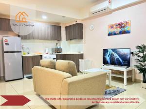 a kitchen with two chairs and a tv in a room at ImpianKU at HYVE SOHO Cyberjaya - Studio - Wifi in Cyberjaya