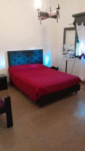 Ένα ή περισσότερα κρεβάτια σε δωμάτιο στο Cazona Villa Carmen2