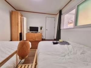 TV/trung tâm giải trí tại Nuha278