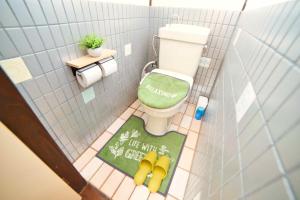 a model of a bathroom with a toilet in a room at ZENNOOK riverside Fuji in Shizuoka +56 photos