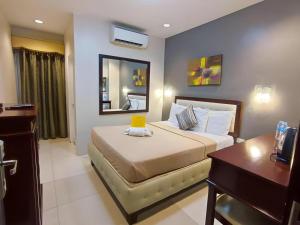 Katil atau katil-katil dalam bilik di Devera Hotel +98 gambar